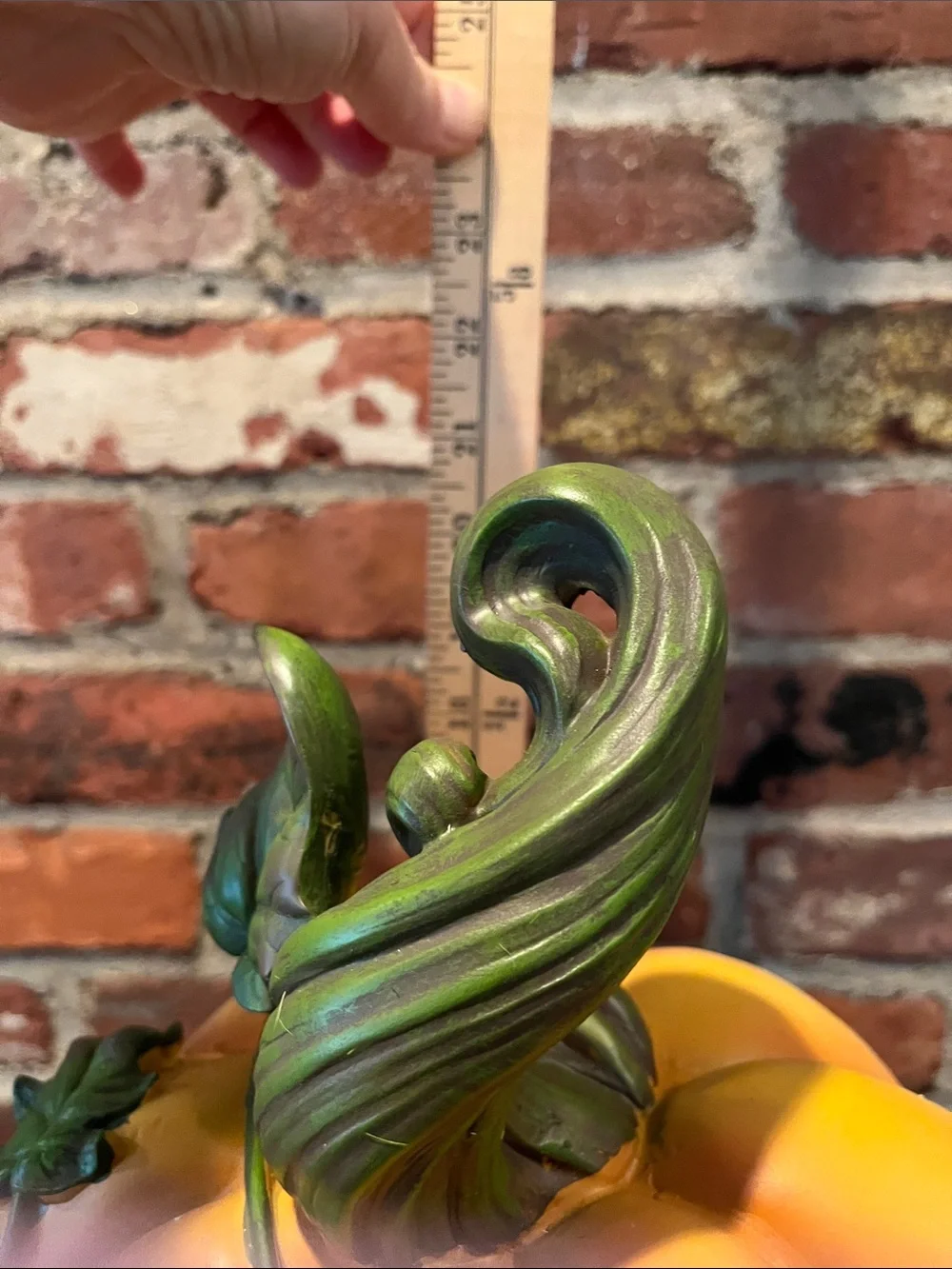 Whimsical Orange Pumpkin Figurine with Pink Accent